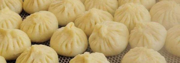 蒸包子怎么不粘笼布